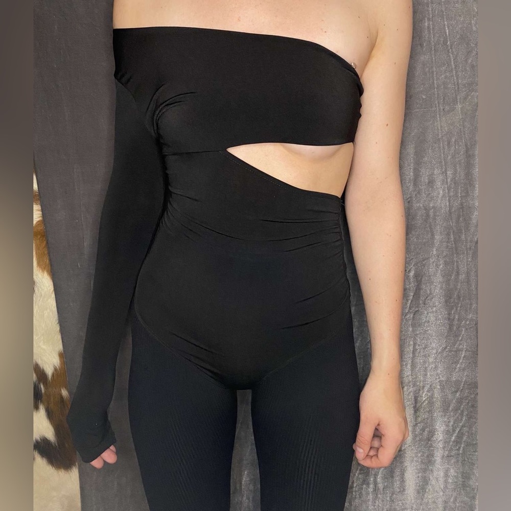 Black one sleeved off the shoulder body suit
